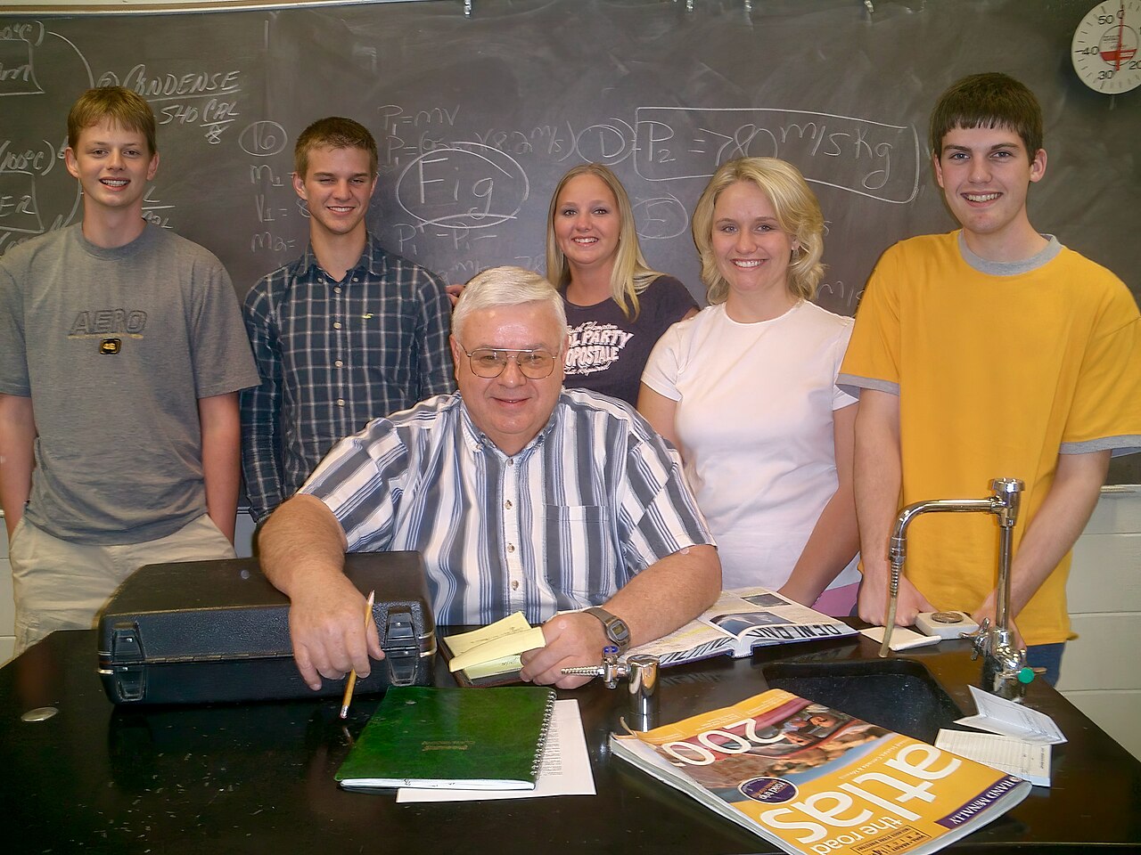 A public high-school teacher in a classroom